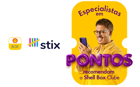 IlImagem de uma mão segurando um celular com a tela de pagamento Shell Box